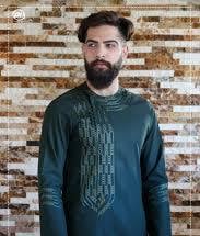 Dark green men's kurta with geometric embroidery