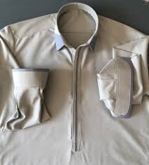 Beige shirt with contrast trim on collar, placket and cuffs